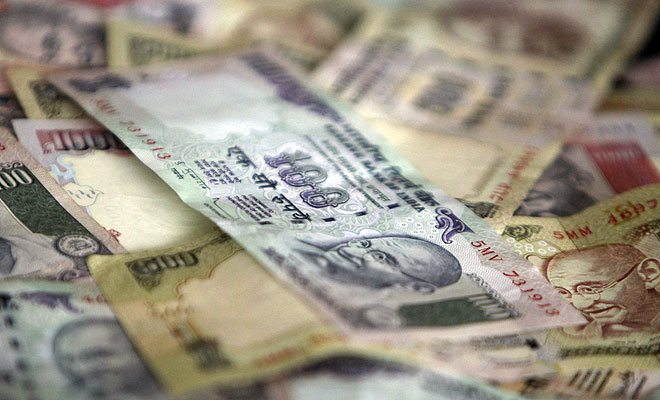  Rupee hits new low at 65.56